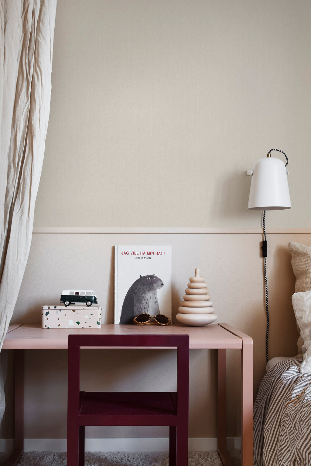 Linne wallpaper by Sandberg in Sandstone, styled on an interior wall
