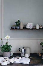 Linne wallpaper by Sandberg in Misty Blue, styled on an interior wall