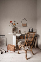 Kalk wallpaper by Sandberg in Sandstone, styled on an interior wall