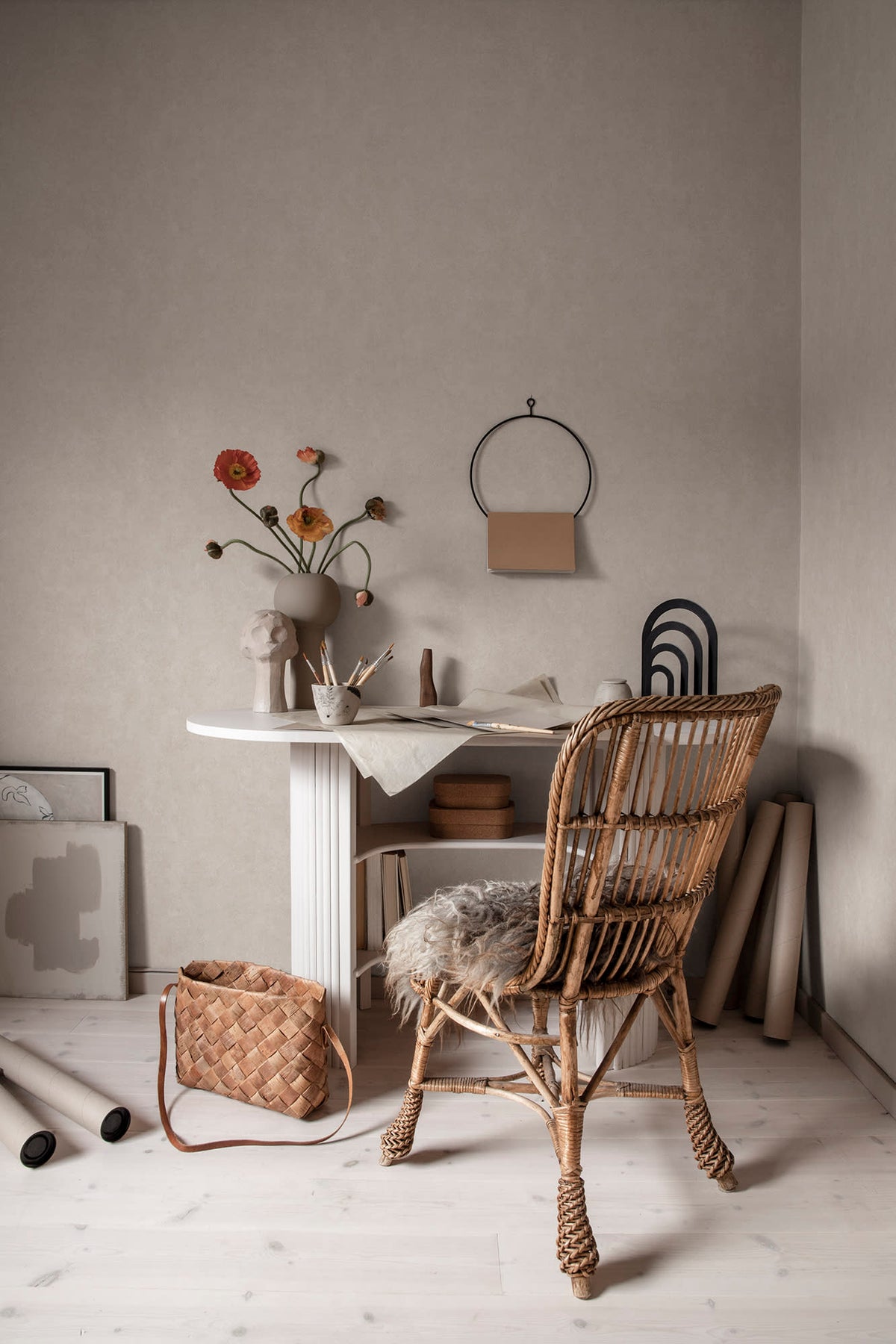 Kalk wallpaper by Sandberg in Sandstone, styled on an interior wall