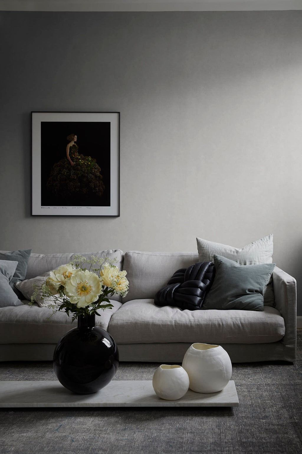 Kalk wallpaper by Sandberg in Grey, styled on an interior wall