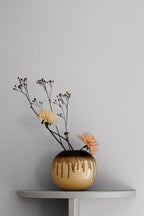 Valv wallpaper by Sandberg in White, styled on an interior wall