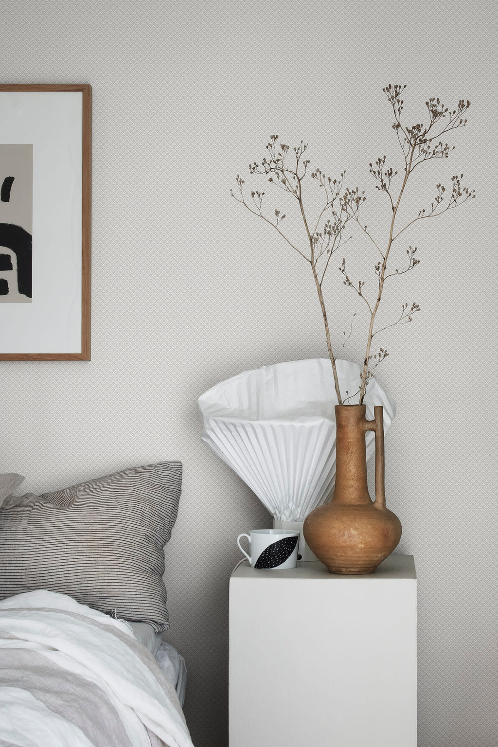 Valv wallpaper by Sandberg in Grey, styled on an interior wall