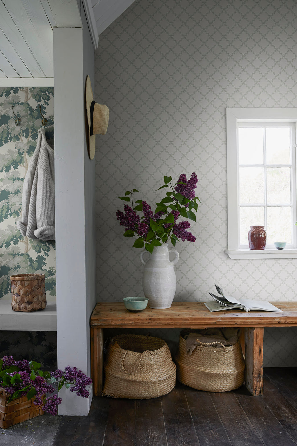 Trellis wallpaper by Sandberg in Garden Green, styled on an interior wall