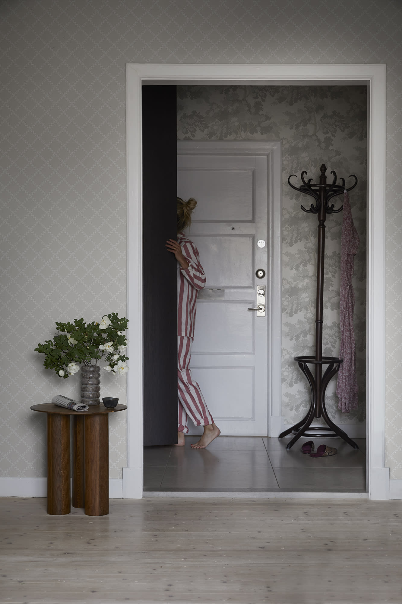 Trellis wallpaper by Sandberg in Grey, styled on an interior wall