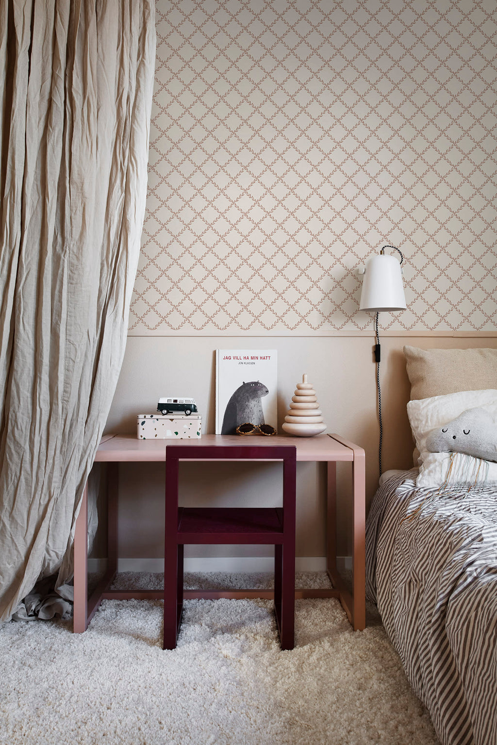 Trellis wallpaper by Sandberg in Terracotta, styled on an interior wall