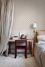 Trellis wallpaper by Sandberg in Terracotta, styled on an interior wall