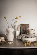 Bladverk wallpaper by Sandberg in Grey, styled on an interior wall
