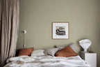 Bladverk wallpaper by Sandberg in Green, styled on an interior wall