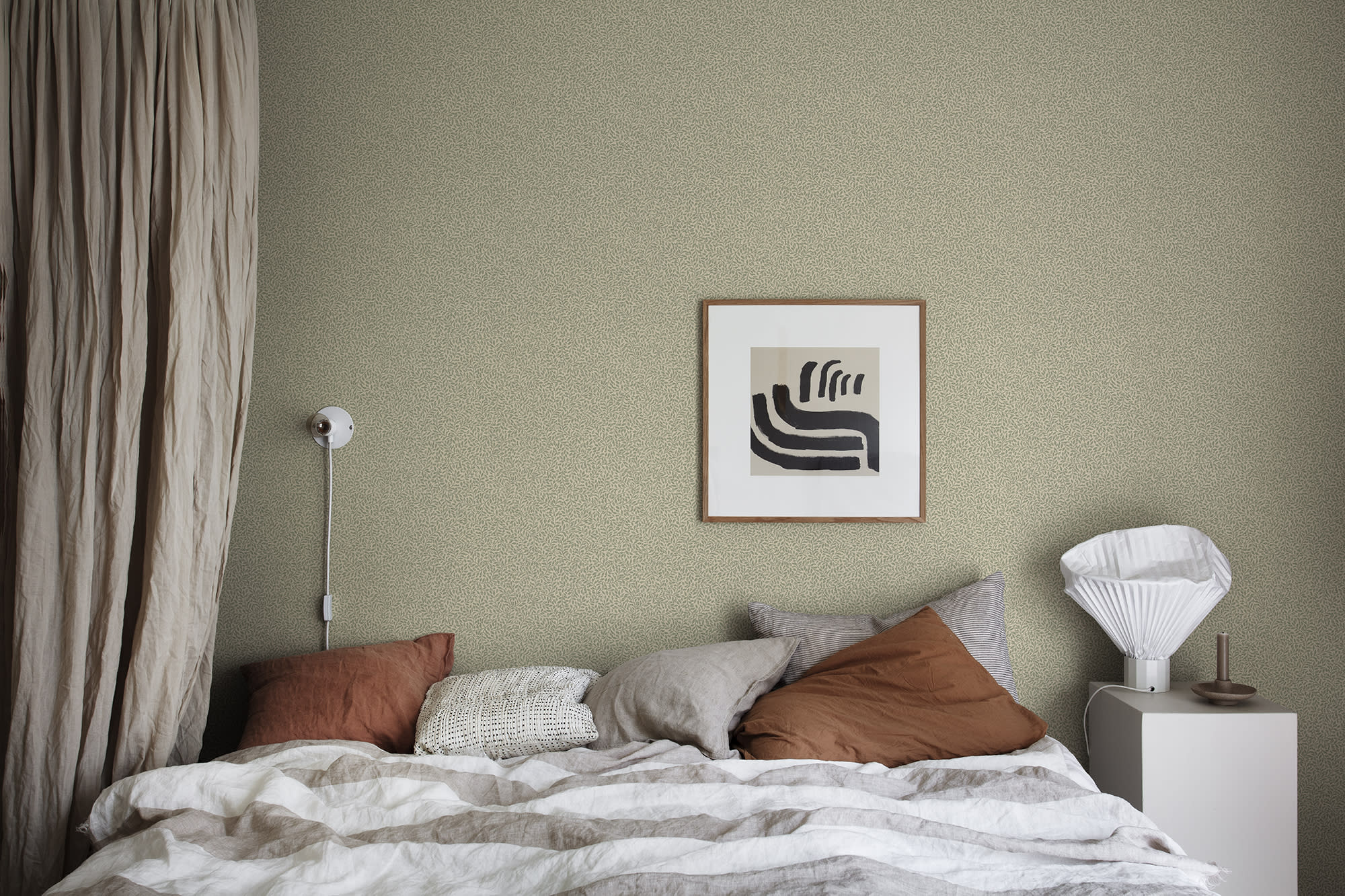 Bladverk wallpaper by Sandberg in Green, styled on an interior wall