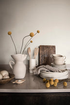 Sten wallpaper by Sandberg in White, styled on an interior wall