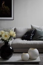Sten wallpaper by Sandberg in Grey, styled on an interior wall