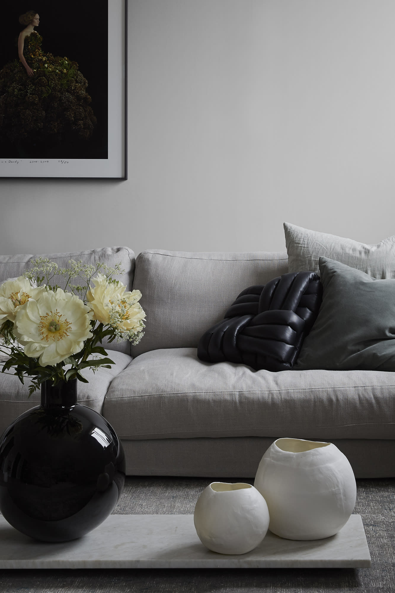 Sten wallpaper by Sandberg in Grey, styled on an interior wall