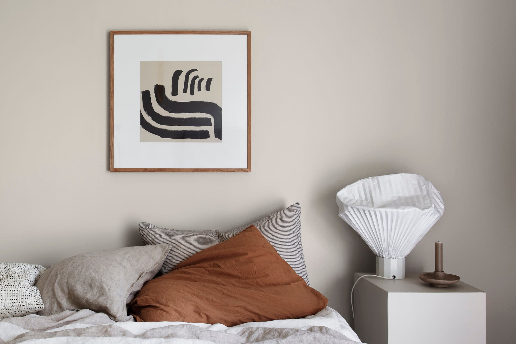 Sten wallpaper by Sandberg in Sandstone, styled on an interior wall