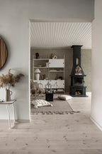 Ruta wallpaper by Sandberg in Garden Green, styled on an interior wall
