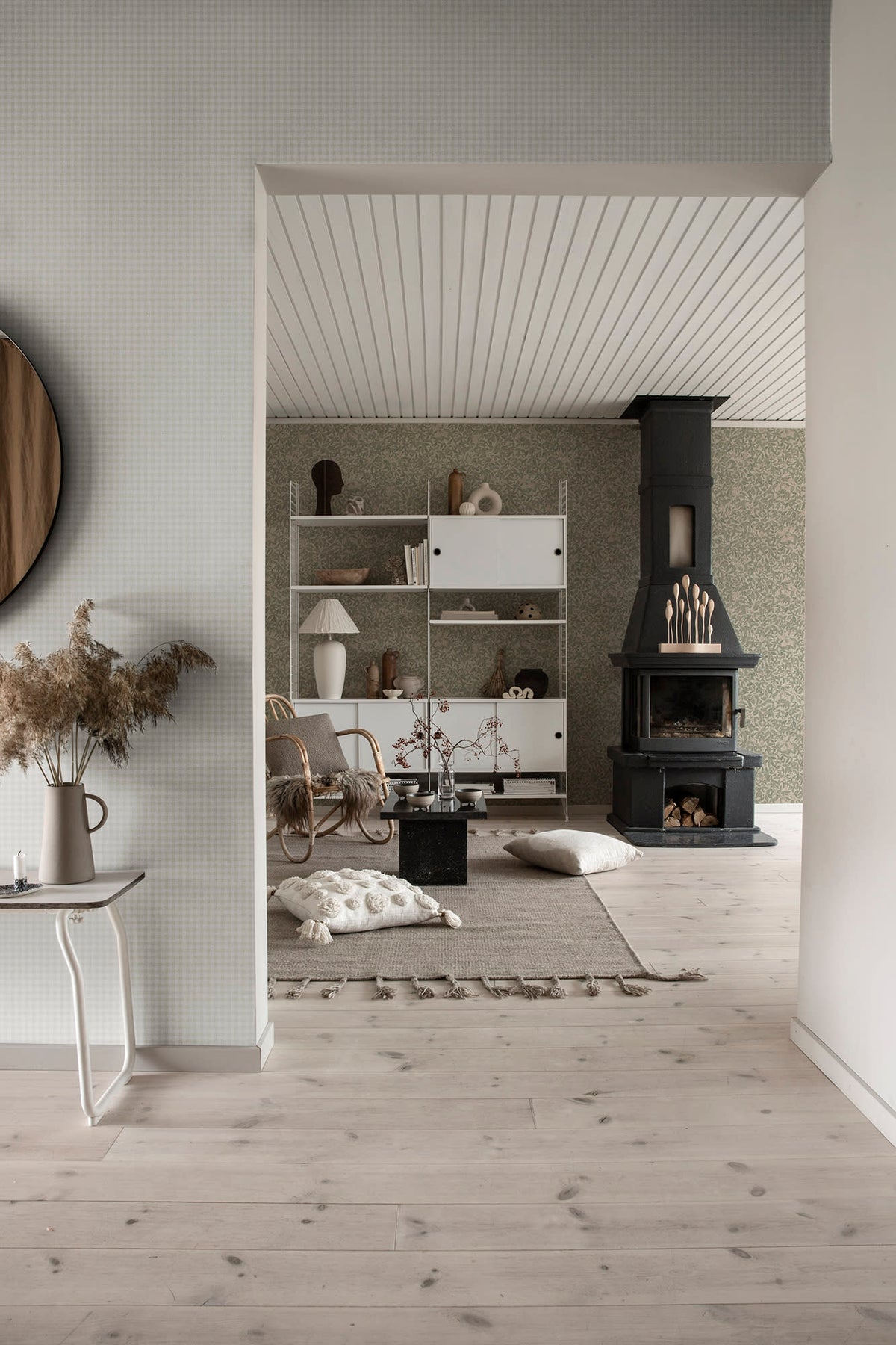 Ruta wallpaper by Sandberg in Garden Green, styled on an interior wall