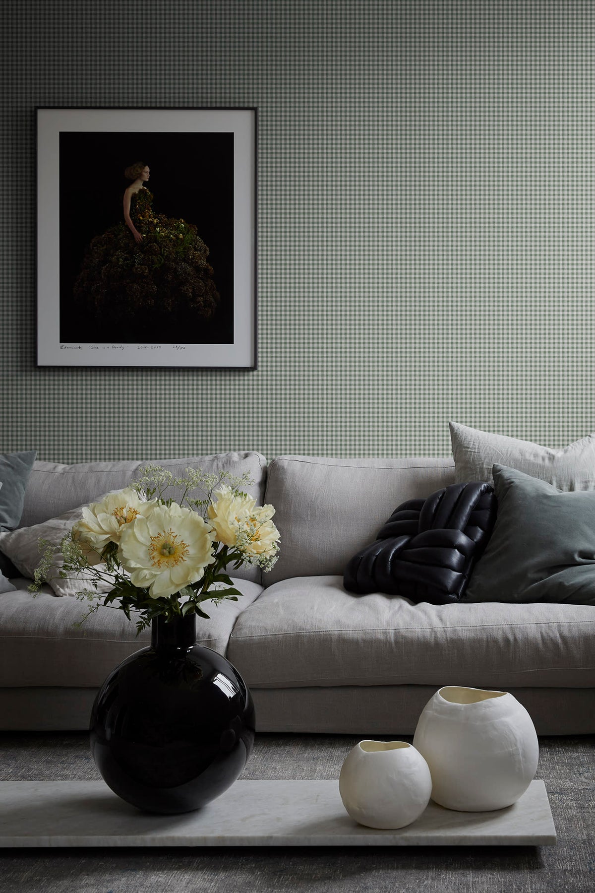 Ruta wallpaper by Sandberg in Forest Green, styled on an interior wall