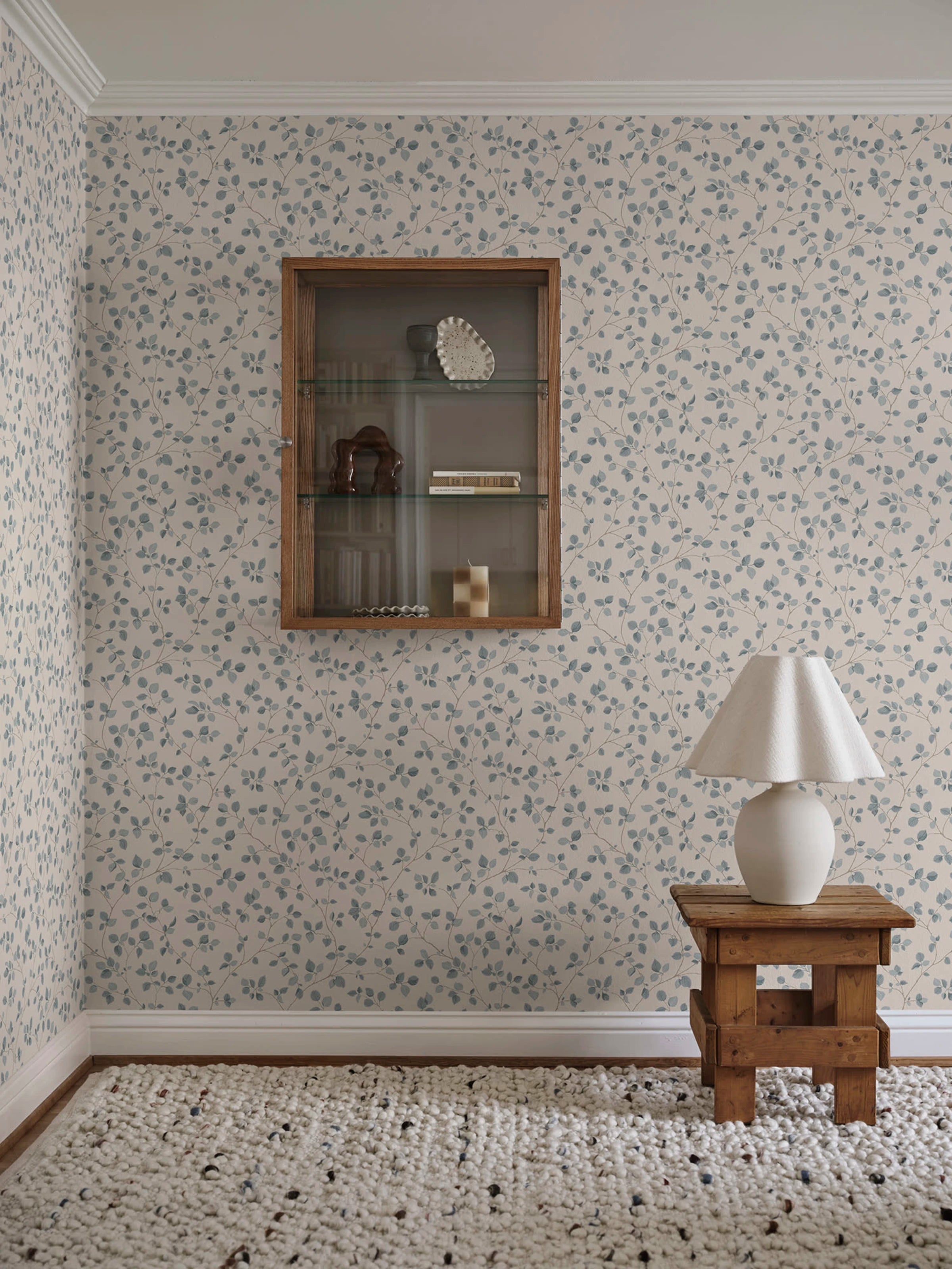 Bokskog wallpaper by Sandberg – Blue – Misty Blue colourway, styled on an interior wall