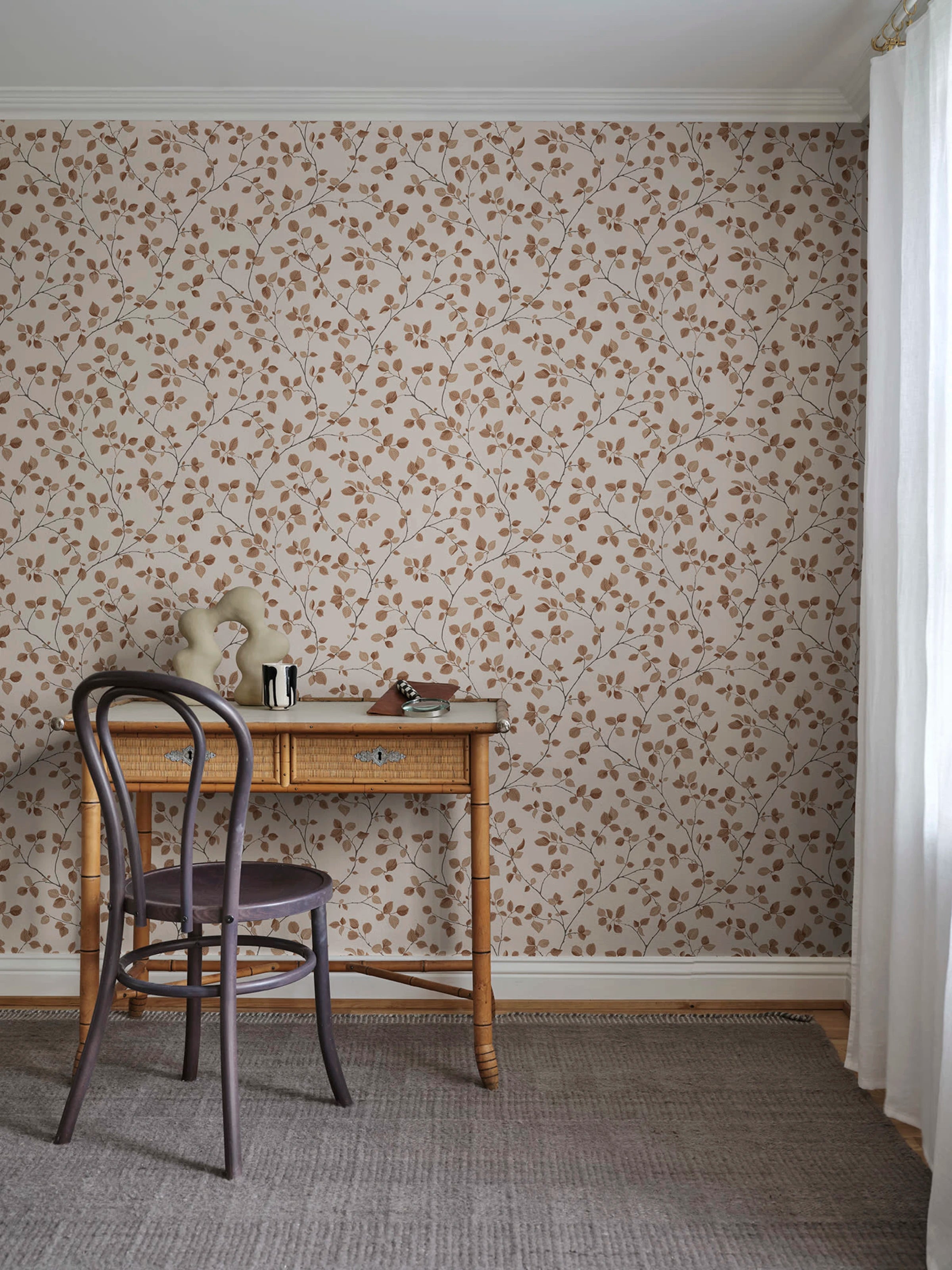 Bokskog wallpaper by Sandberg – Orange – Terracotta colourway, styled on an interior wall