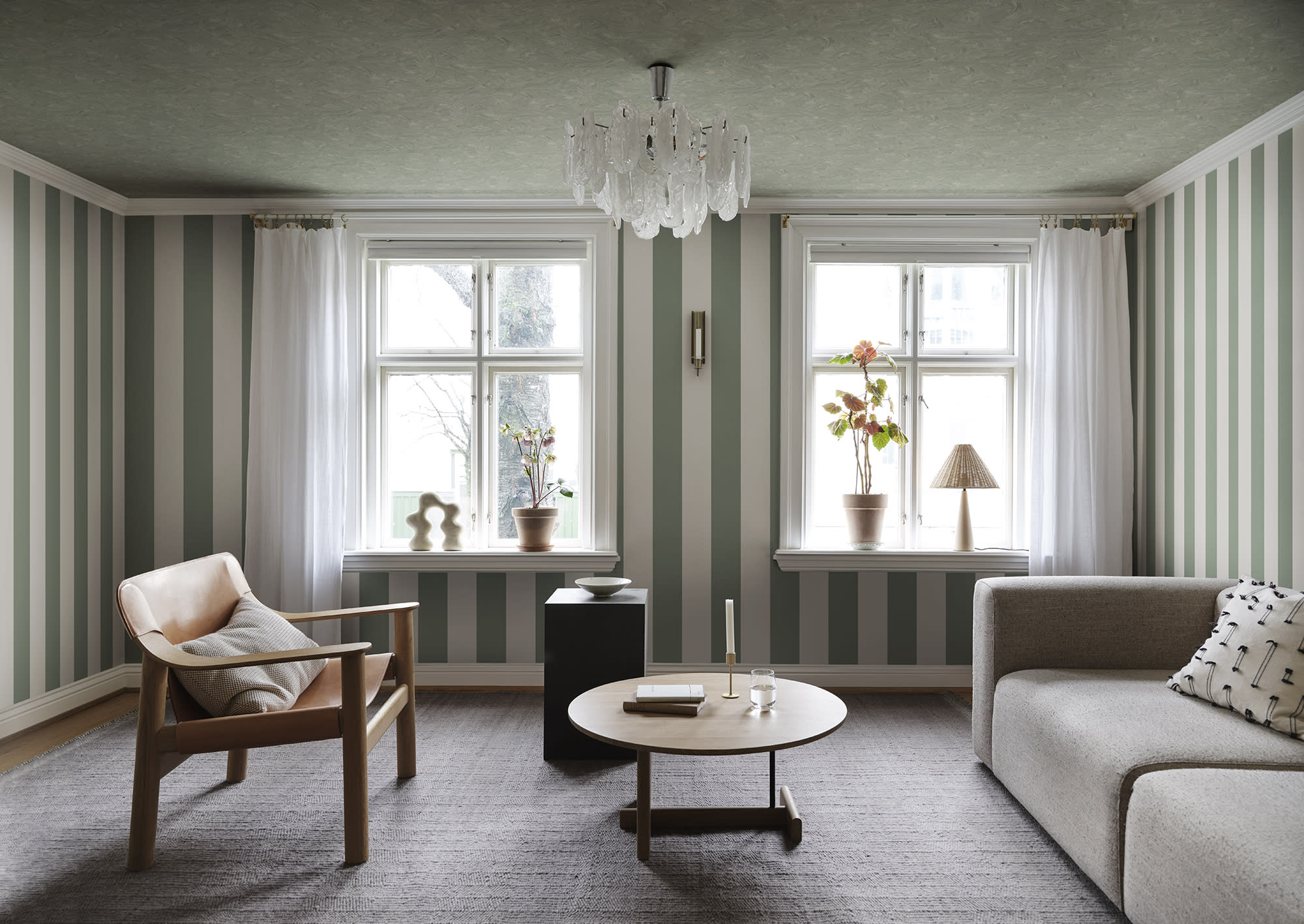 Marion wallpaper by Sandberg in Sage Green, styled on an interior wall