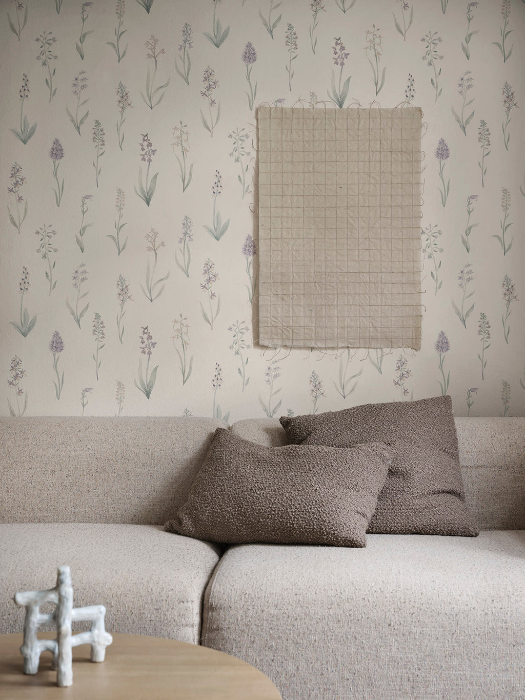 Alma wallpaper by Sandberg in Lilac, styled on an interior wall