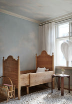 Moln Ceiling wall mural by Sandberg – sky & clouds design, Light Blue – styled in a room setting, view 2