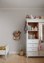 Betty wallpaper by Sandberg in a nursery, tiny blue floral sprig pattern beside a white wardrobe and toddler bed