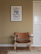 Betty wallpaper by Sandberg in Honey, styled on an interior wall
