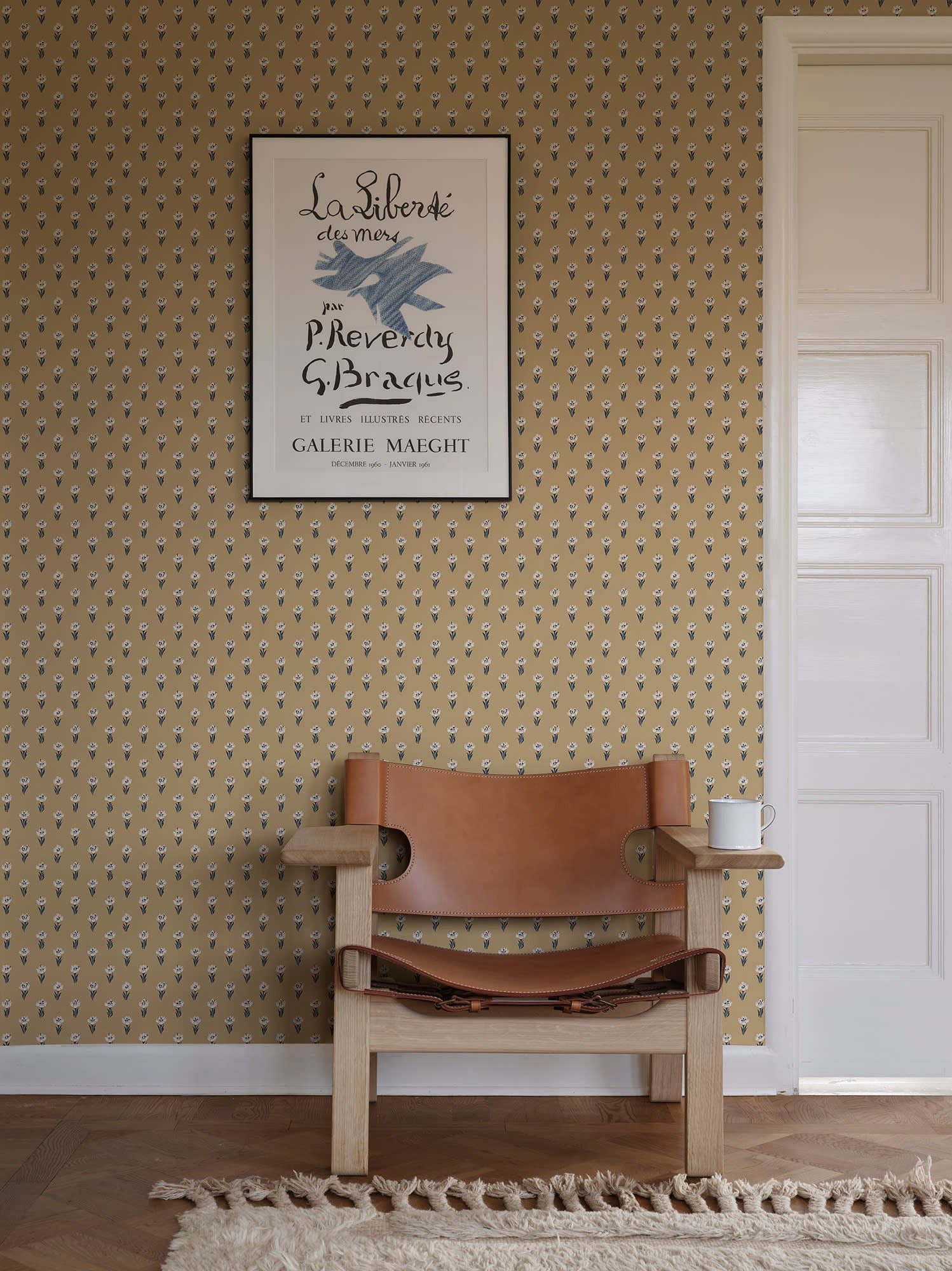 Betty wallpaper by Sandberg in Honey, styled on an interior wall