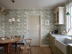 Raphael wallpaper by Sandberg in Light Green, styled on an interior wall