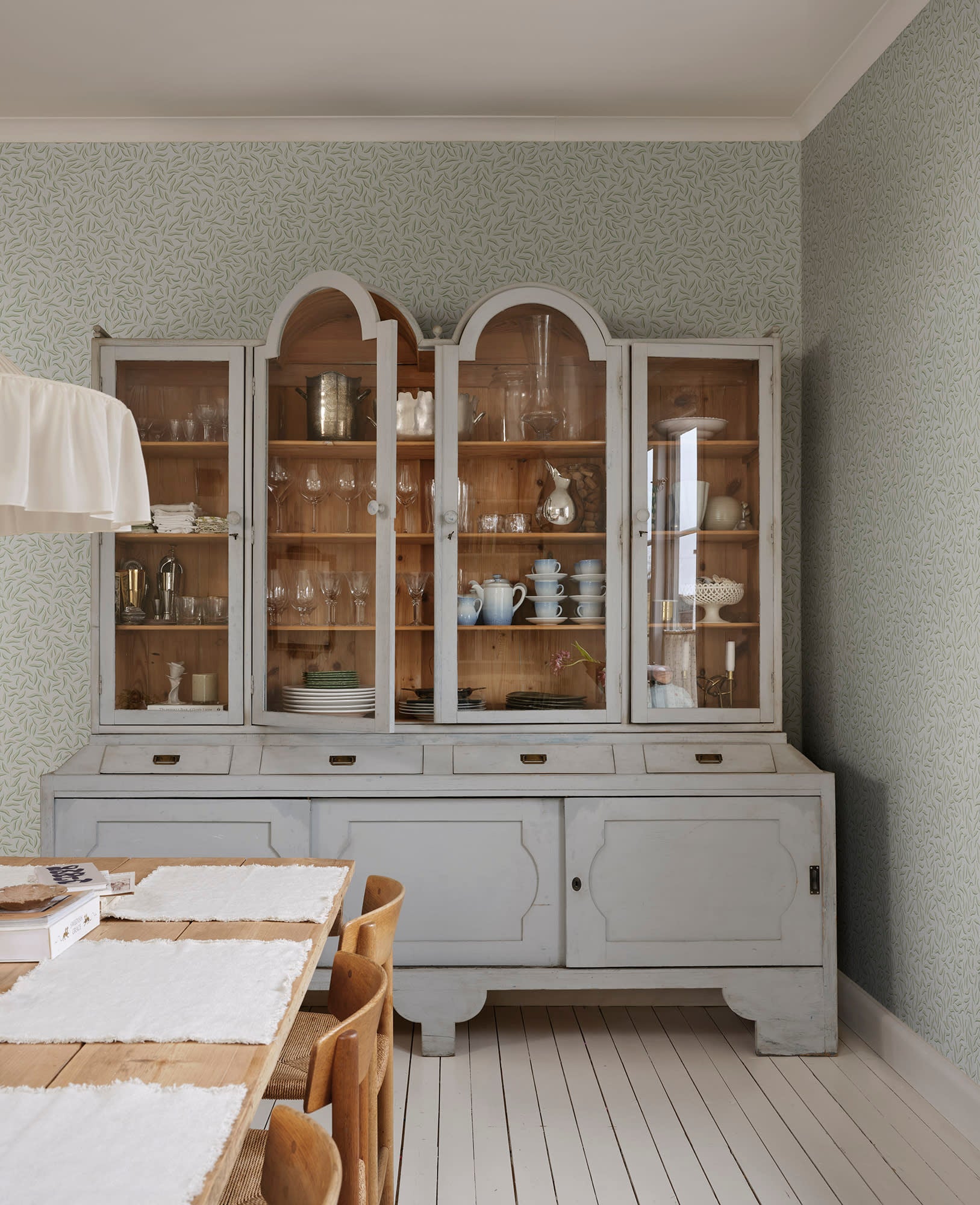 Karolina wallpaper by Sandberg in Light Blue, styled on an interior wall
