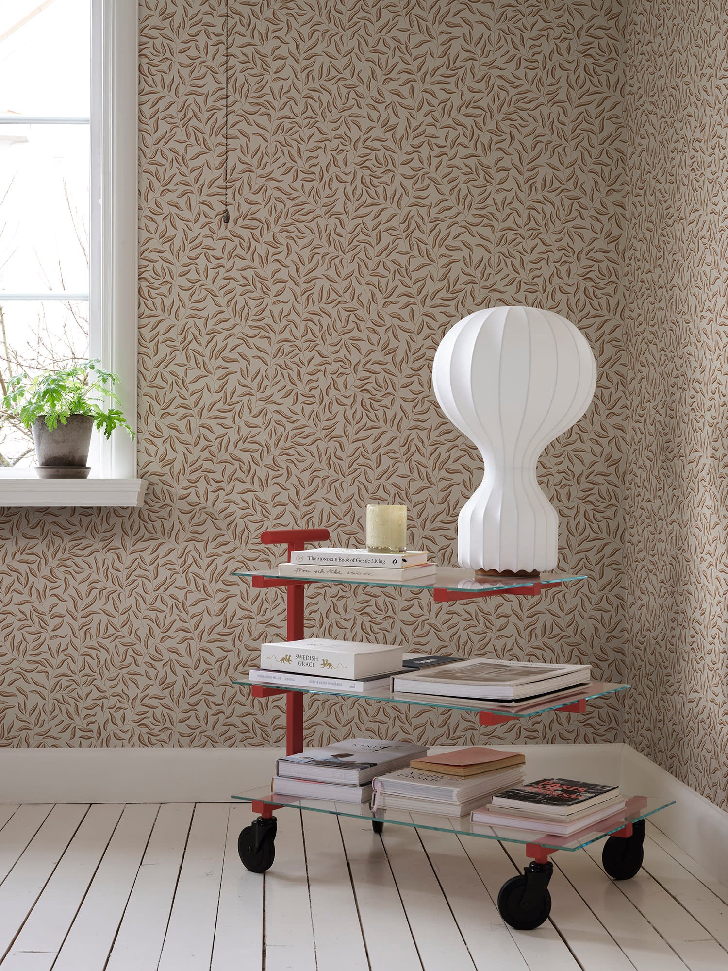 Karolina wallpaper by Sandberg in Hazel, styled on an interior wall