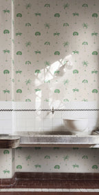 Milo Palms wallpaper by Sandberg in green on blush, styled in a scullery above a stone trough sink and tiled splashback