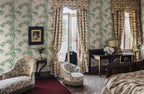 Leon wallpaper by Sandberg in Garden Green, styled on an interior wall