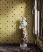 Audrey wallpaper by Sandberg in Honey, styled on an interior wall