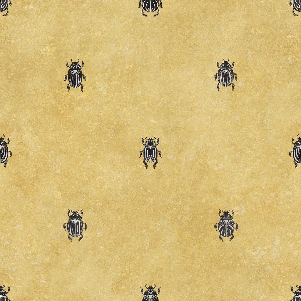 Audrey wallpaper by Sandberg, charcoal scarab beetle motif on a warm mustard-yellow ground, flat swatch