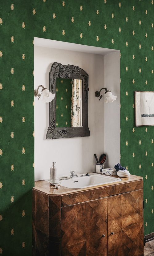 Audrey wallpaper by Sandberg in Dark Green, styled on an interior wall