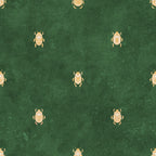 Audrey wallpaper by Sandberg, golden scarab beetle motif on a rich emerald green ground, flat swatch