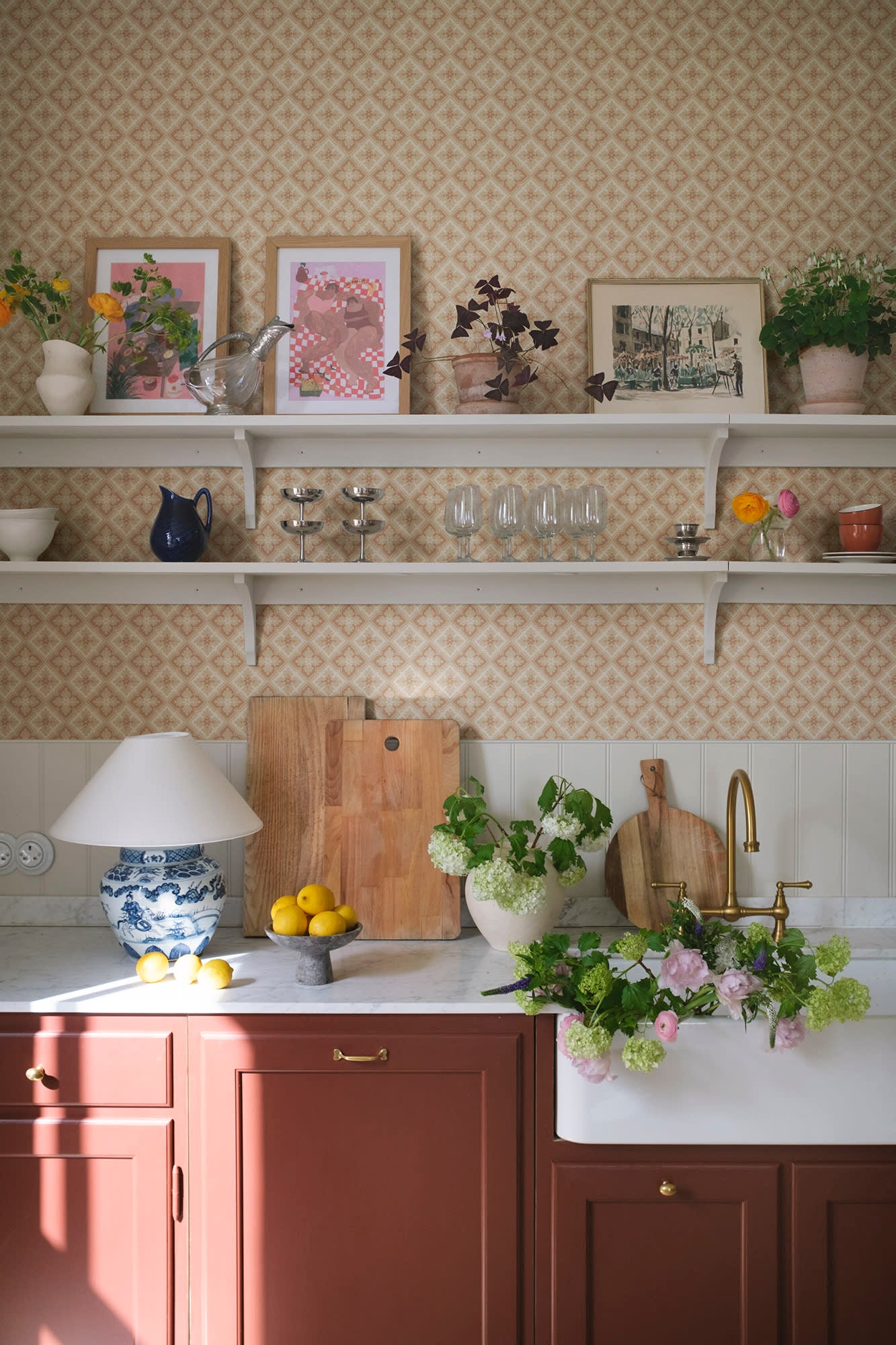 Edvin wallpaper by Sandberg in Terracotta, styled on an interior wall