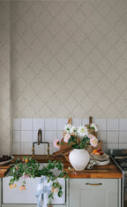 Ewa wallpaper by Sandberg in soft greige with a floral trellis vine above a tiled kitchen sink and dahlias