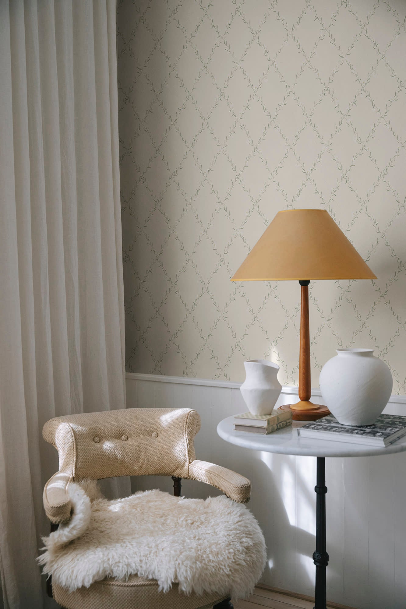 Ewa wallpaper by Sandberg in Sandstone, styled on an interior wall