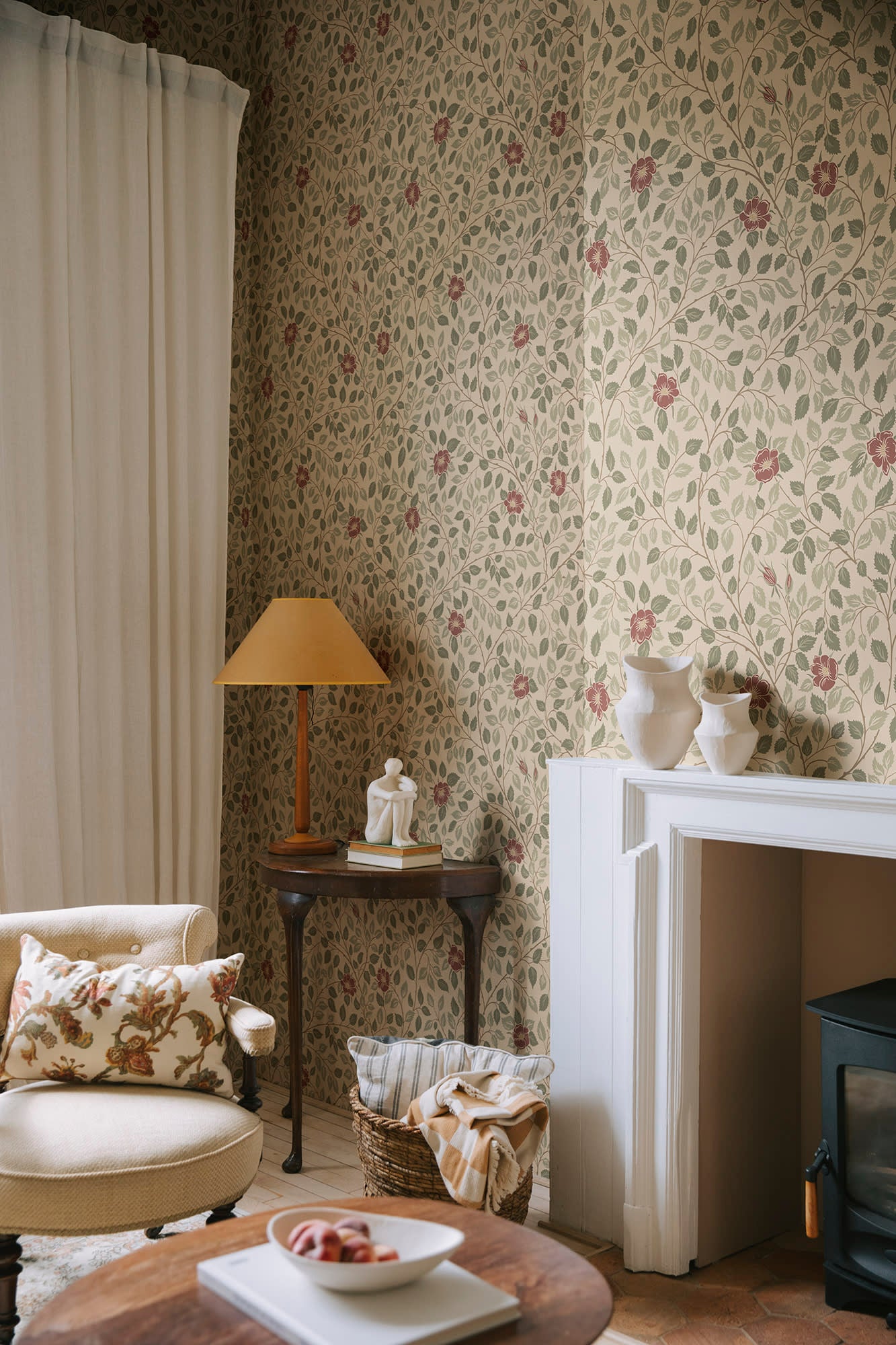 Solliden wallpaper by Sandberg in Burgundy, styled on an interior wall