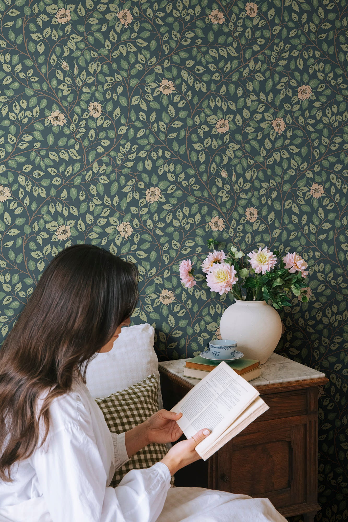 Solliden wallpaper by Sandberg in Midnight Blue, styled on an interior wall