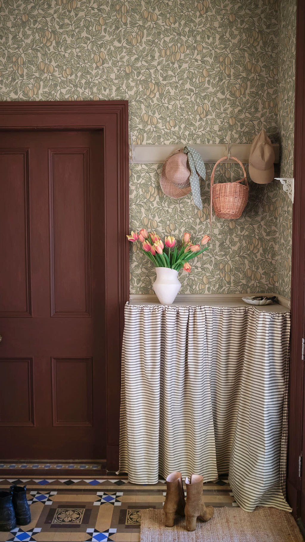 Emrik wallpaper by Sandberg in Oat, styled on an interior wall