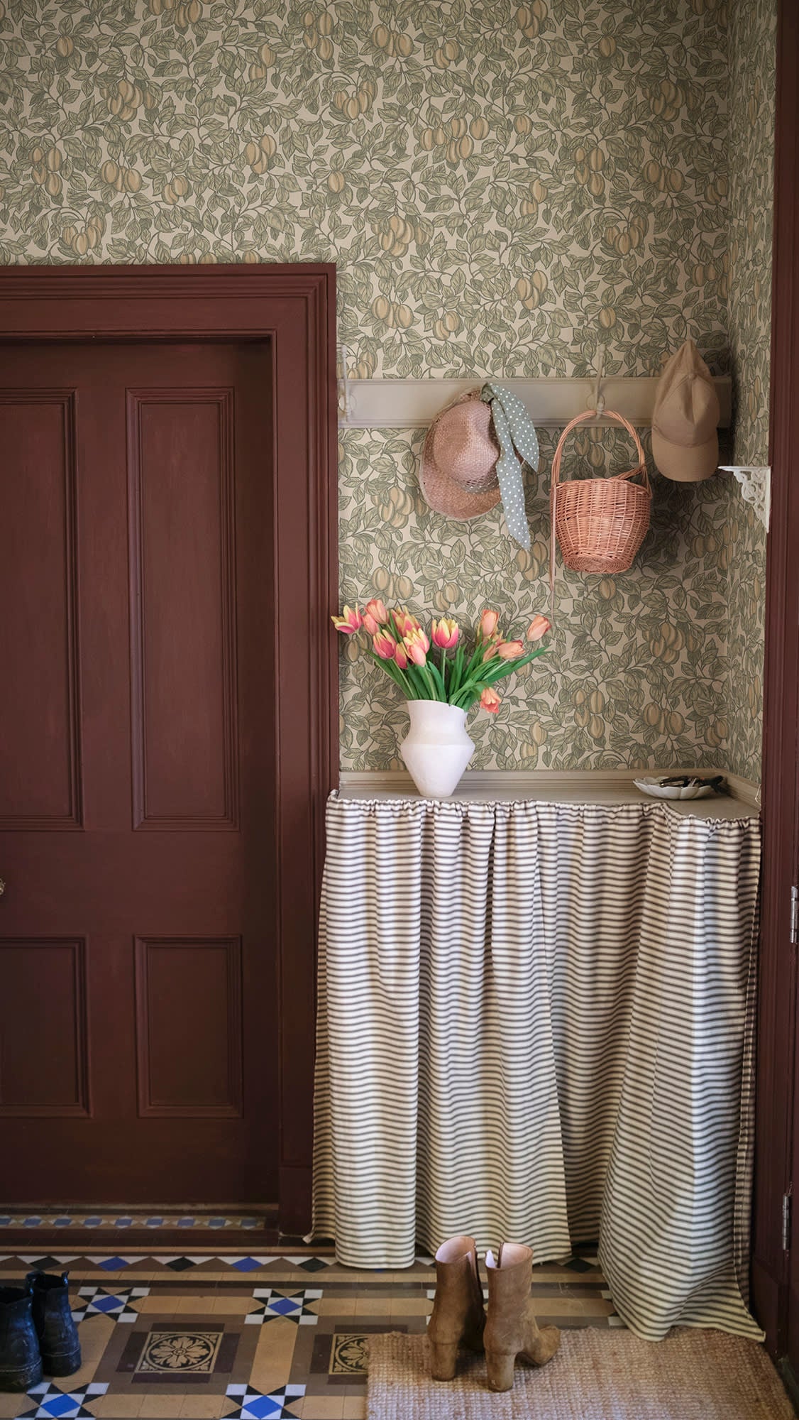 Emrik wallpaper by Sandberg in Oat, styled on an interior wall