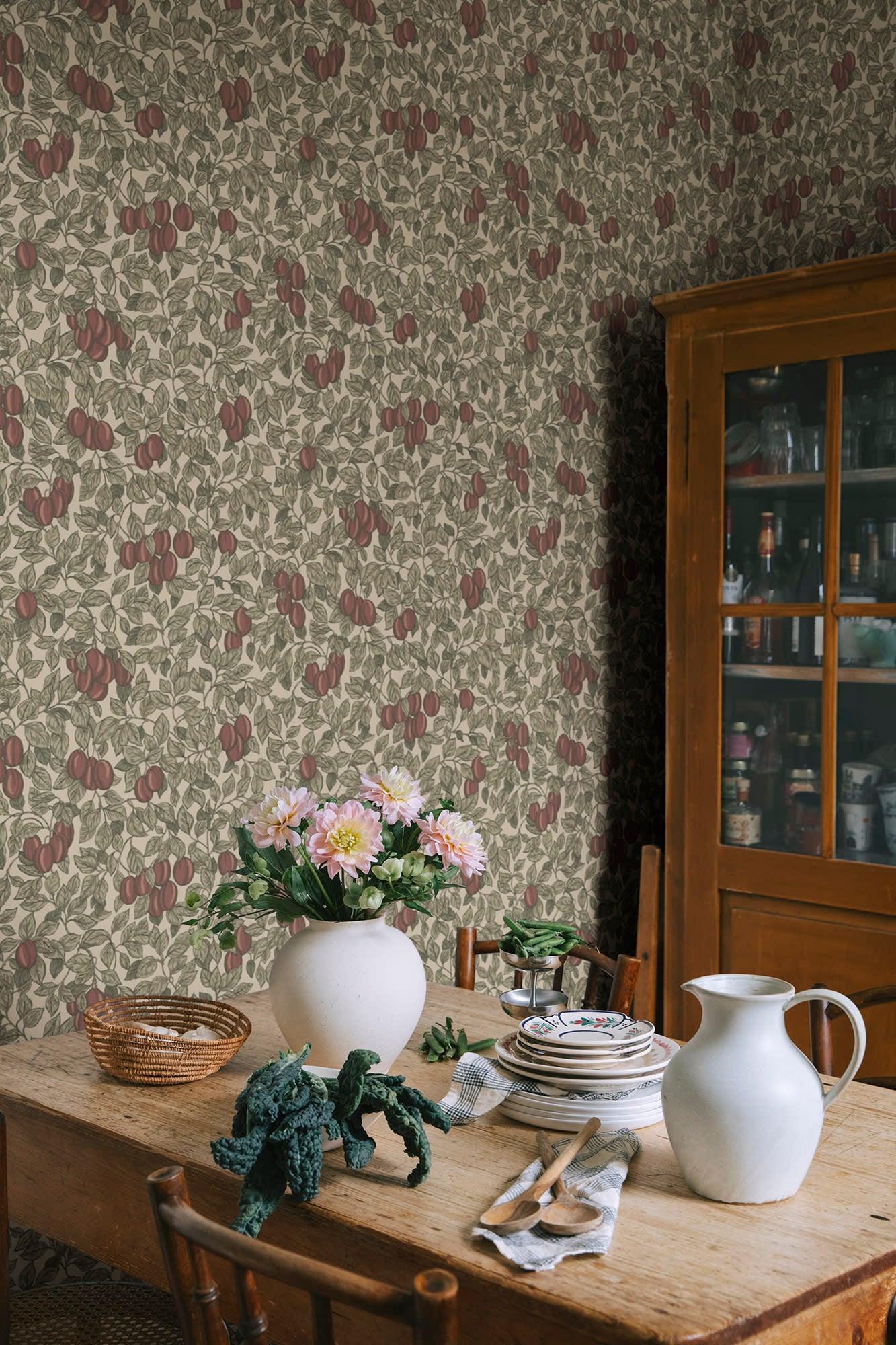 Emrik wallpaper by Sandberg in Burgundy, styled on an interior wall