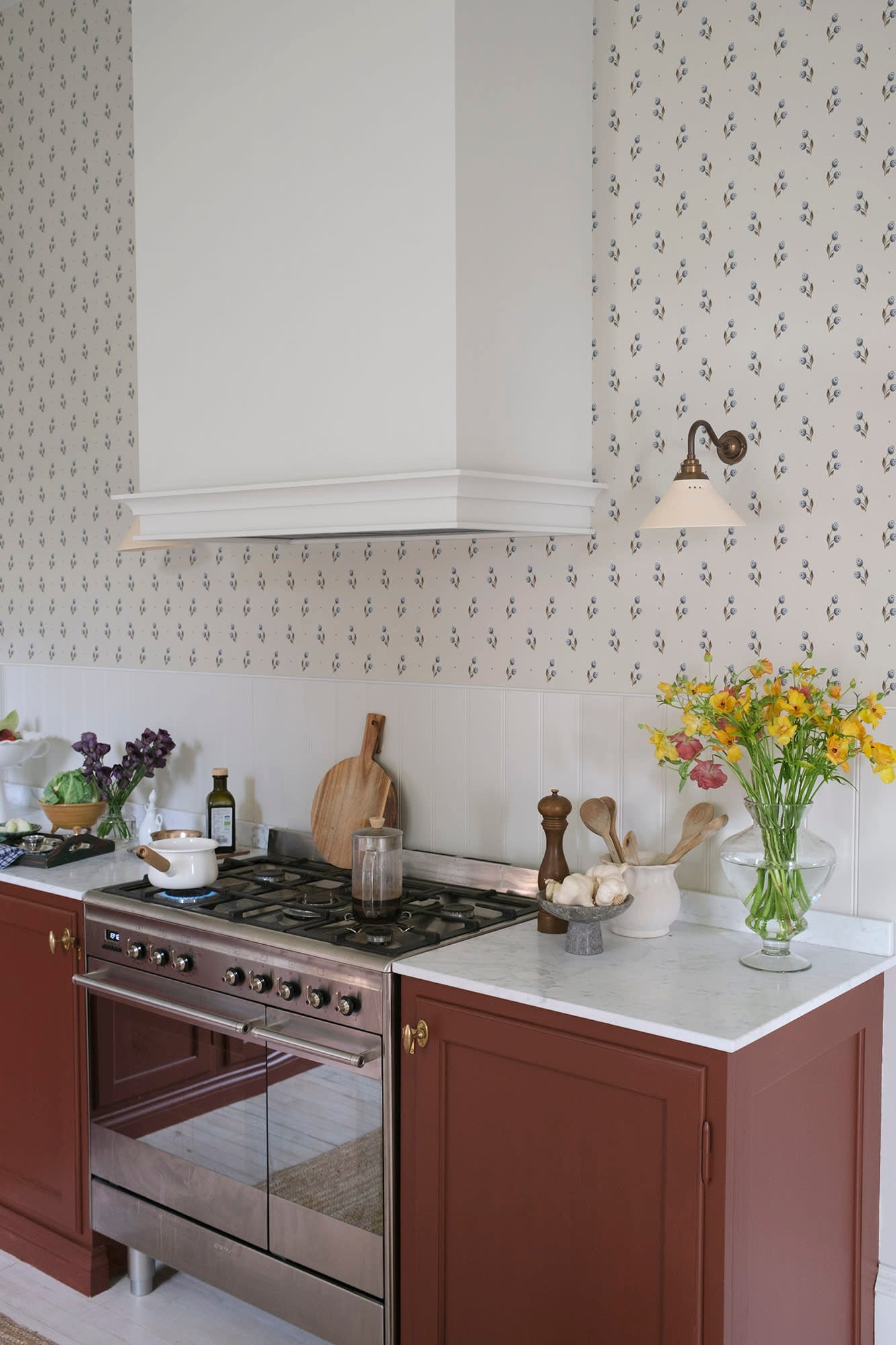 Siv wallpaper by Sandberg in Misty Blue, styled on an interior wall