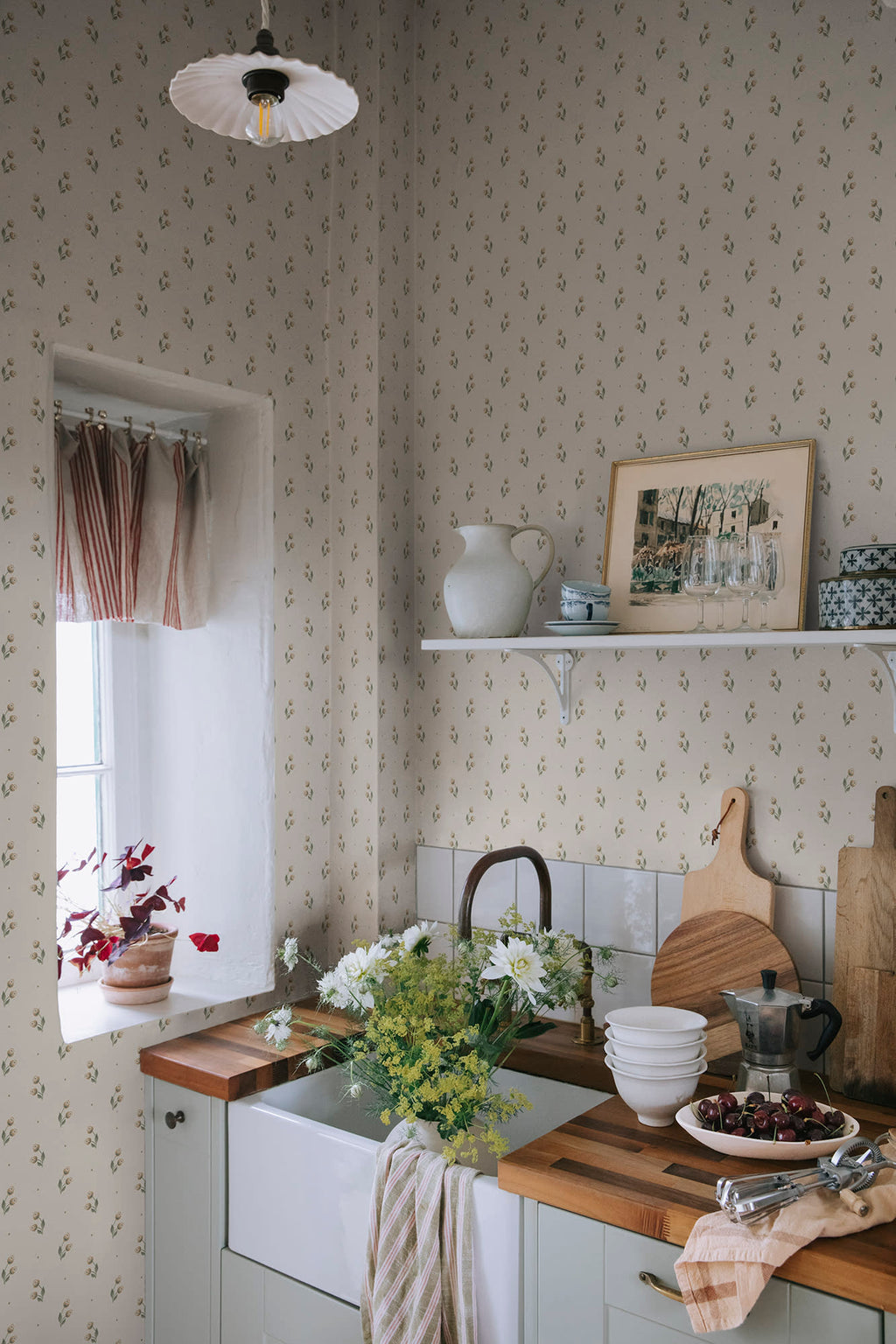 Siv wallpaper by Sandberg in Oat, styled on an interior wall