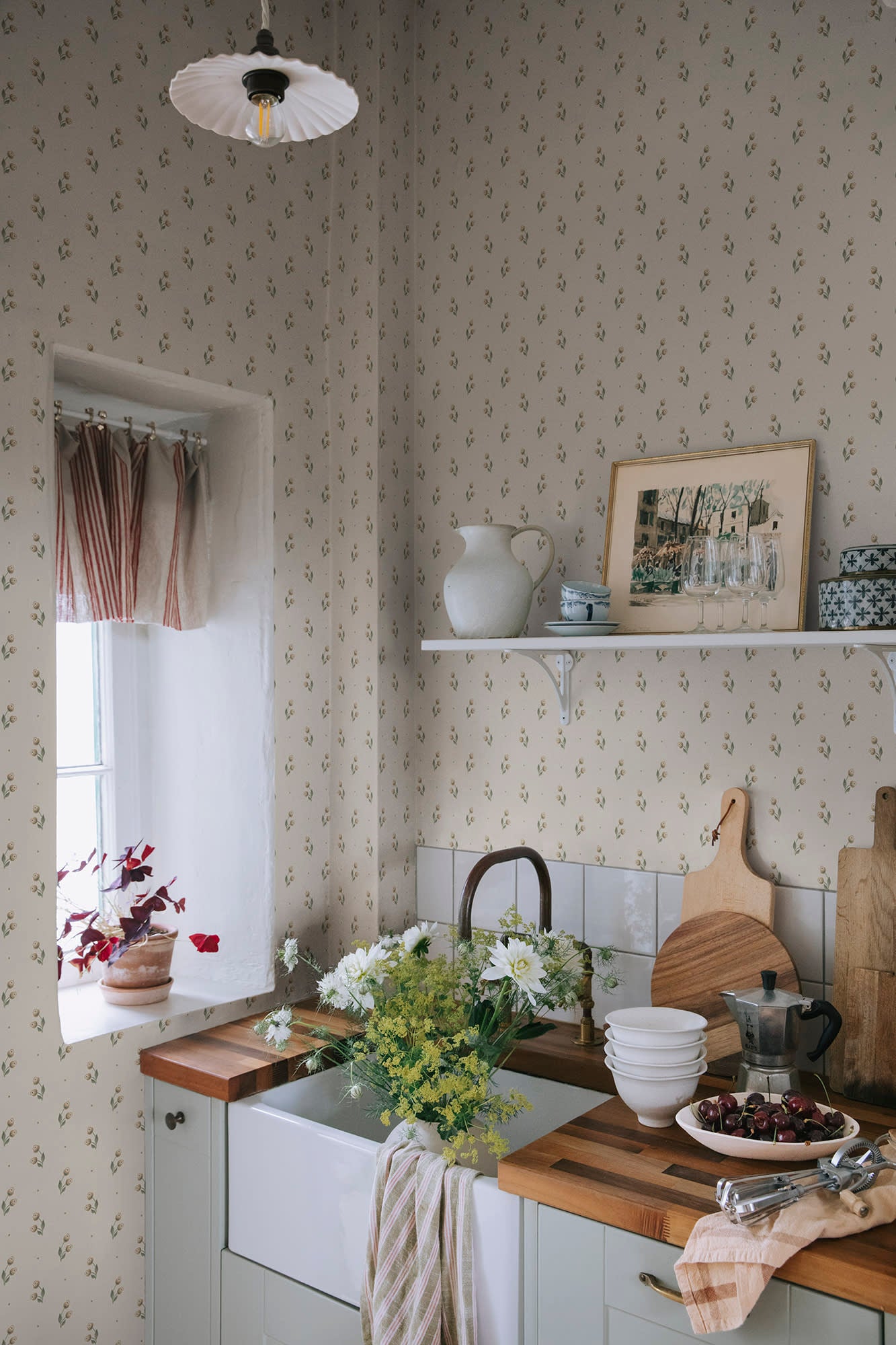 Siv wallpaper by Sandberg in Oat, styled on an interior wall