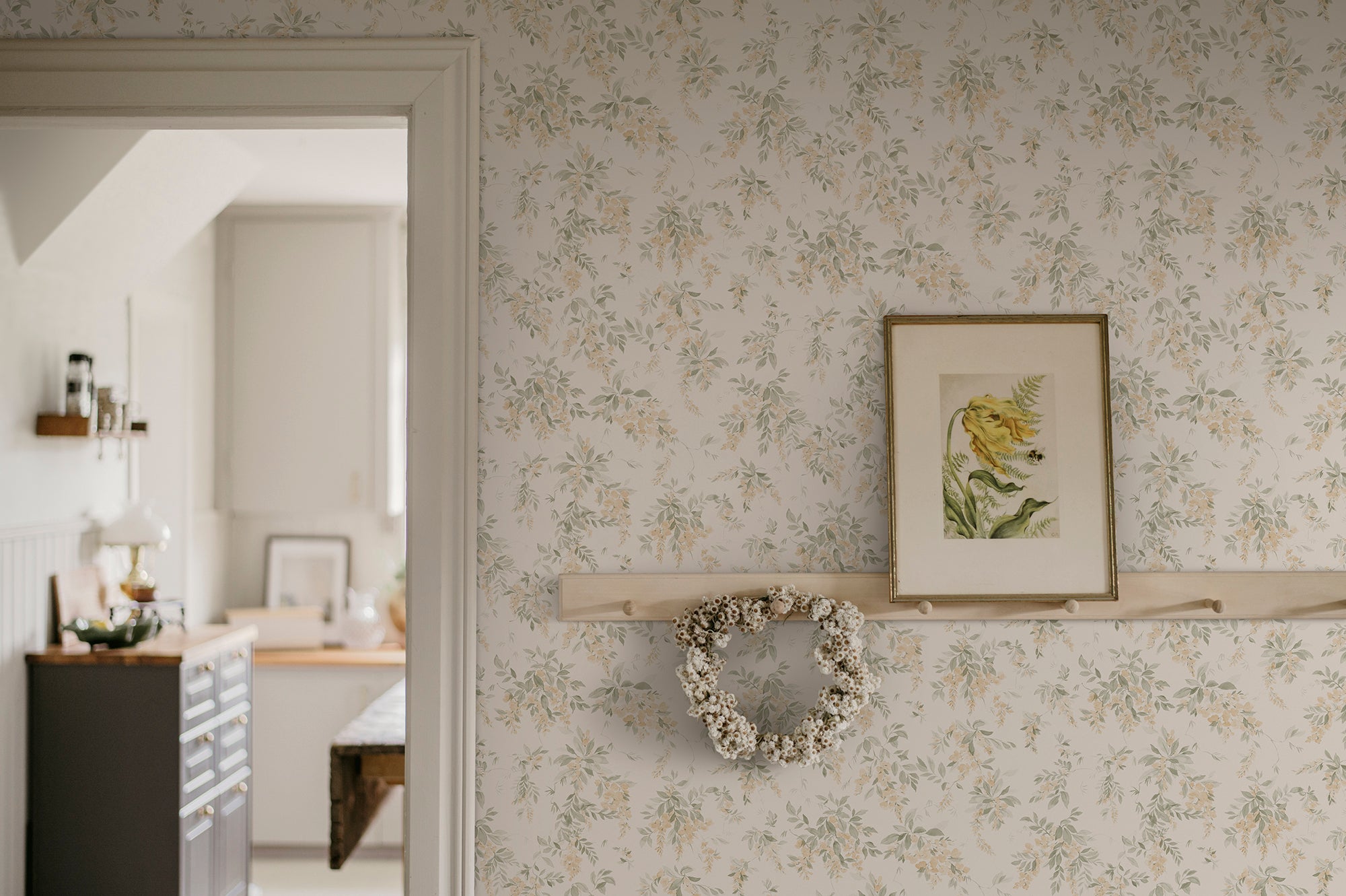Lovisa wallpaper by Sandberg in Spring Green, styled on an interior wall